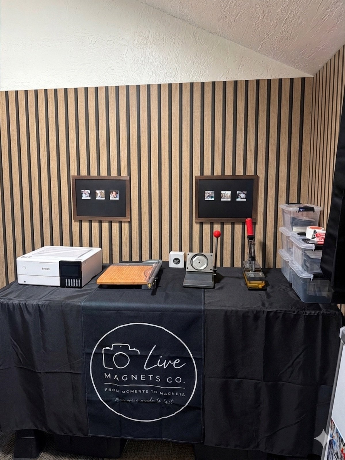 Live Magnets Co. display table set up for a wedding reception
