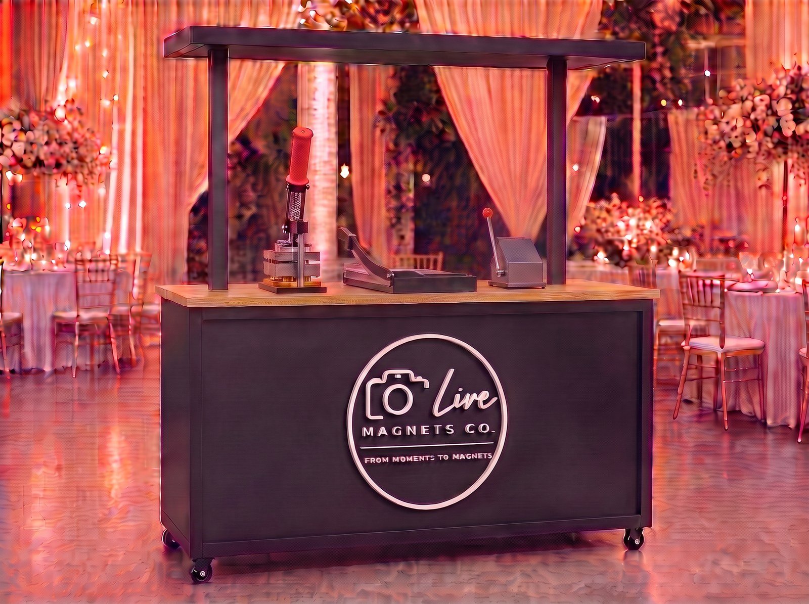 Live Magnets Co. printing cart set up at an elegant wedding reception