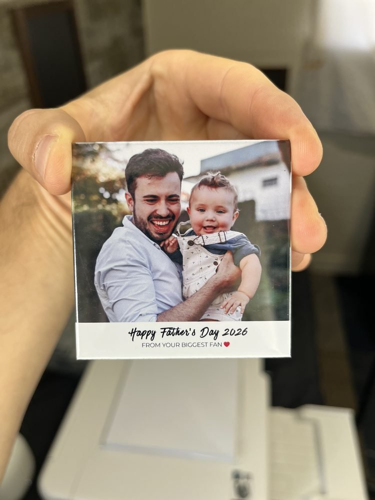 Custom Father's Day photo magnet of a dad holding his baby