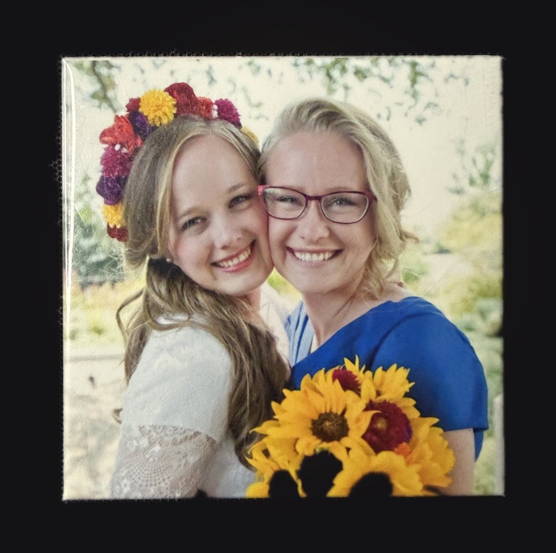 Custom photo magnet of a bride and bridesmaid with sunflowers